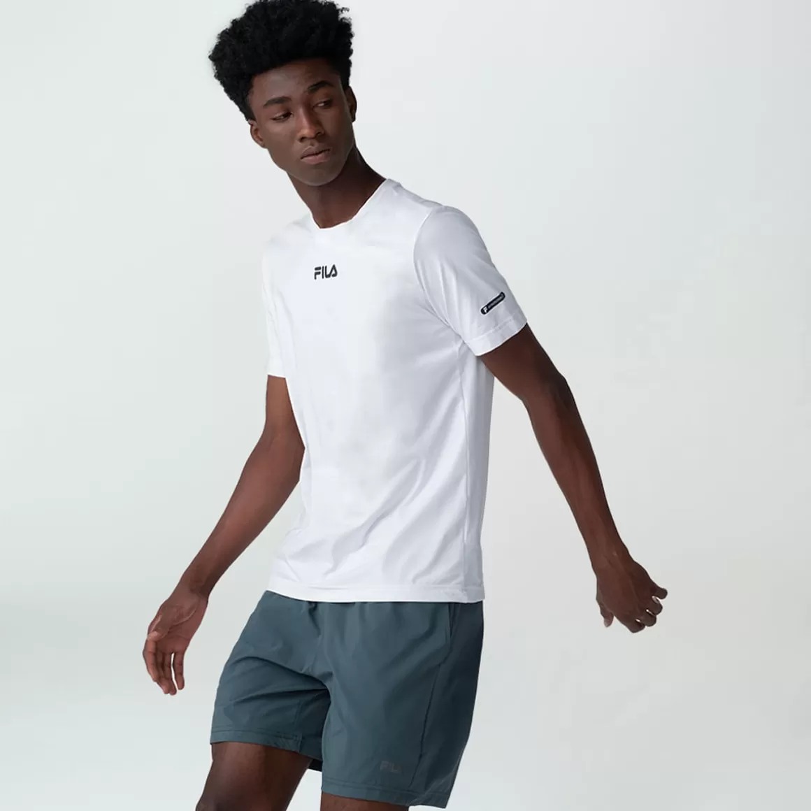 FILA Camiseta Tecnológica Sun Protect Breezy Branca - * Respirabilidade | Controle de temperatura