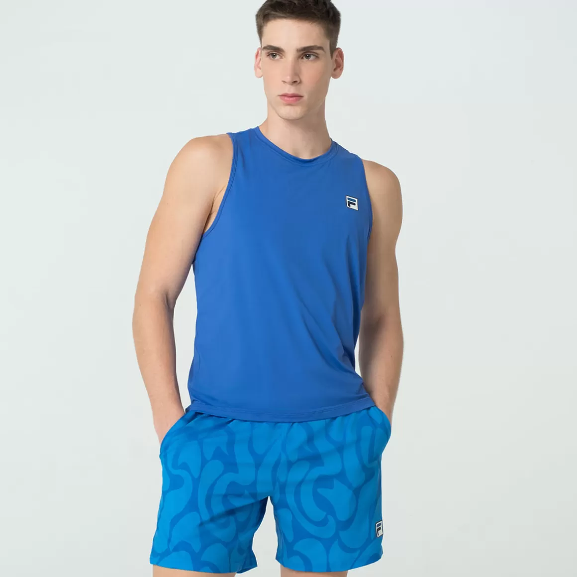 FILA Regata Esportiva Masculina Beach Eco Azul - * Controle de temperatura | Roupas com Proteção UV